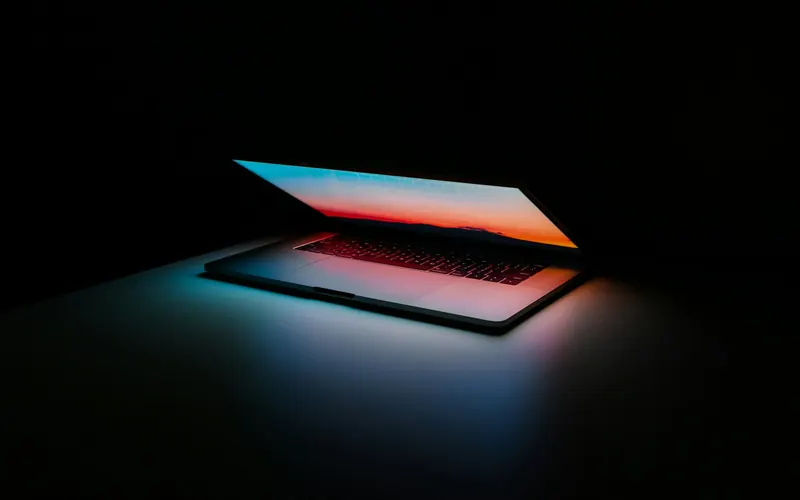 Laptop glowing in the dark